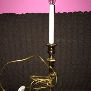 Antique brass candle